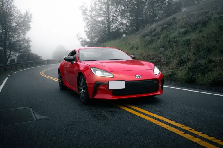 A Red Toyota GR86 on an Asphalt Road