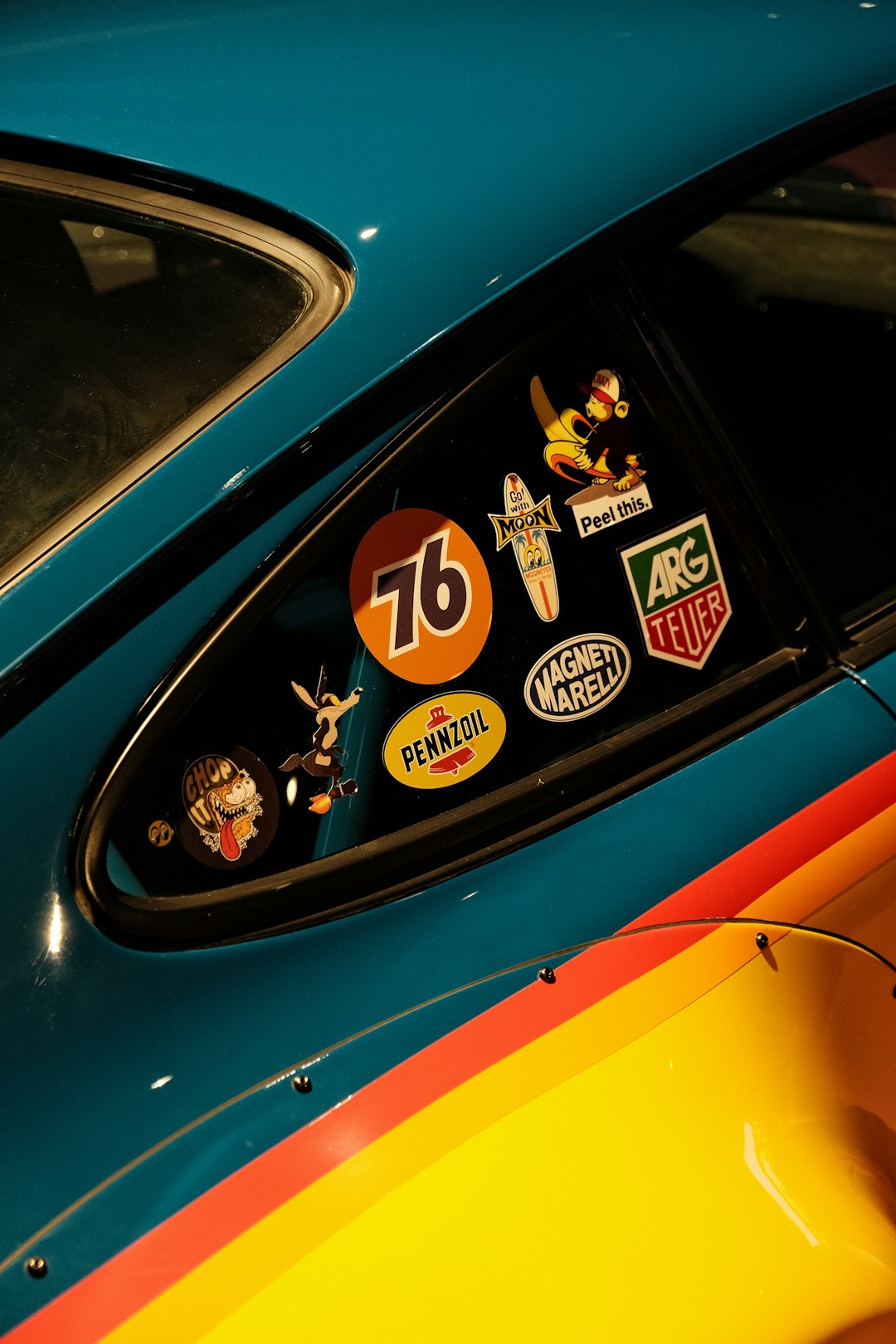 a close up of a car with stickers on it