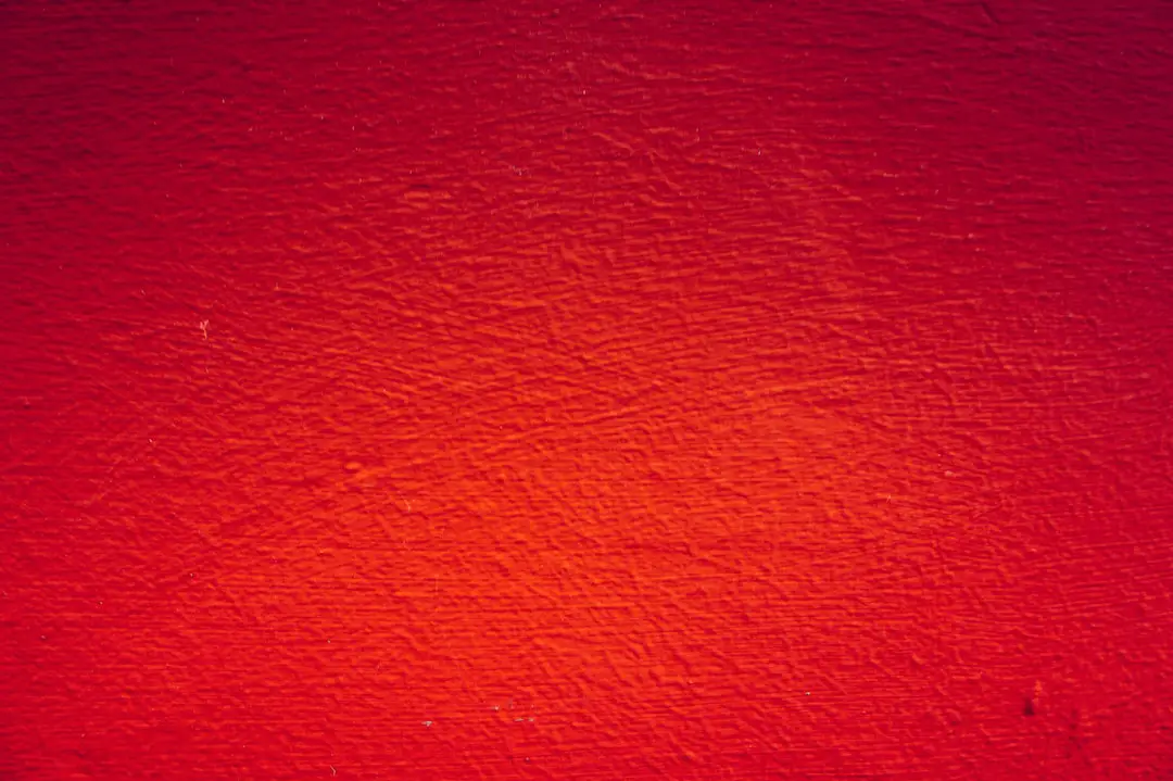 red painted wall in close up photography