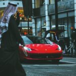 red sports car in street