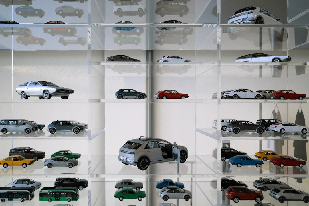 A display case filled with lots of toy cars