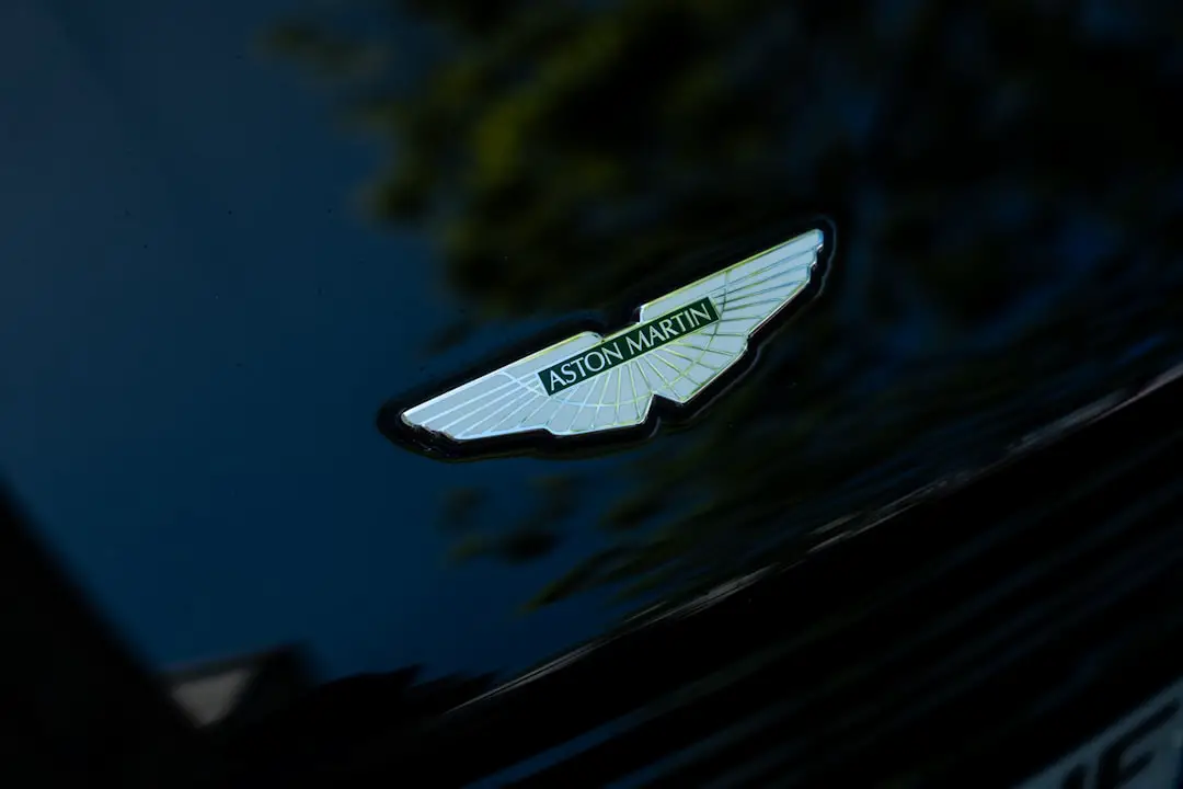 Aston martin's winged emblem is displayed on the car.